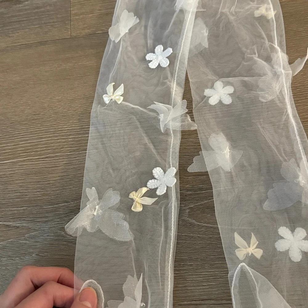New Opera length tulle butterfly and bow embellished globes